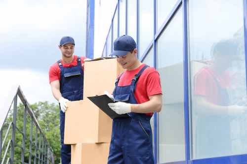 Careful loading of a sofa during Hammersmith furniture pick-up
