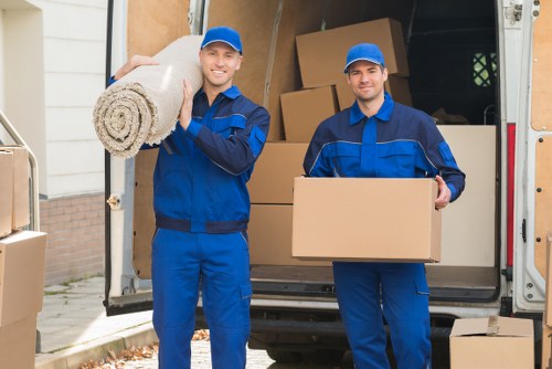 Loading furniture into a van near Hammersmith residential streets
