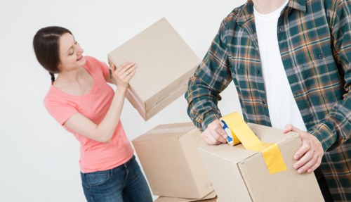 Loading office furniture with care for a local business relocation