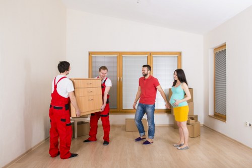 Office relocation setup with boxes and desks in Hammersmith