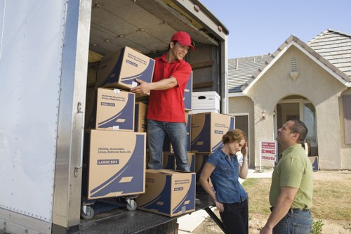 Team carrying out a careful lifting operation during relocation