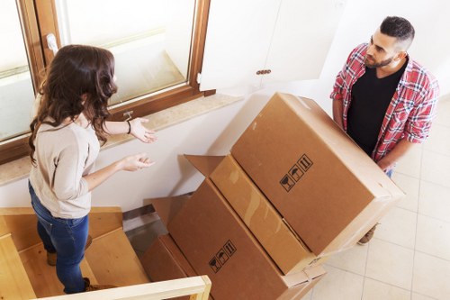 Removal team preparing a house move on a busy Hammersmith street
