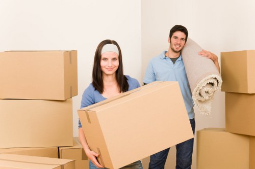 Moving boxes and furniture prepared for a home relocation in Hammersmith