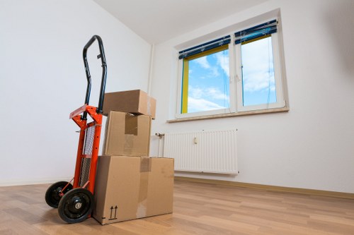 Packed boxes and furniture ready for home removals