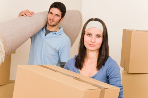 House removalists preparing furniture and boxes for a move in Hammersmith