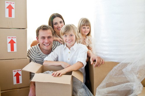 Packed household furniture ready for transport during a Hammersmith move